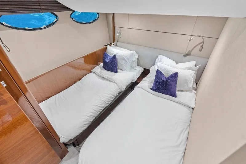 Slide: The Image of Luxurious twin cabin in 2016 Princess 60 Flybridge Motor Yacht with elegant bedding. - 45