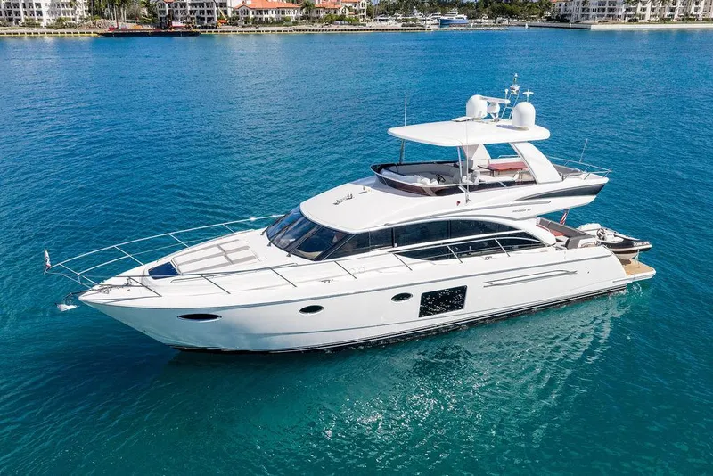 Slide: The Image of 2016 Princess 60 Flybridge Motor Yacht on clear blue water. - 5