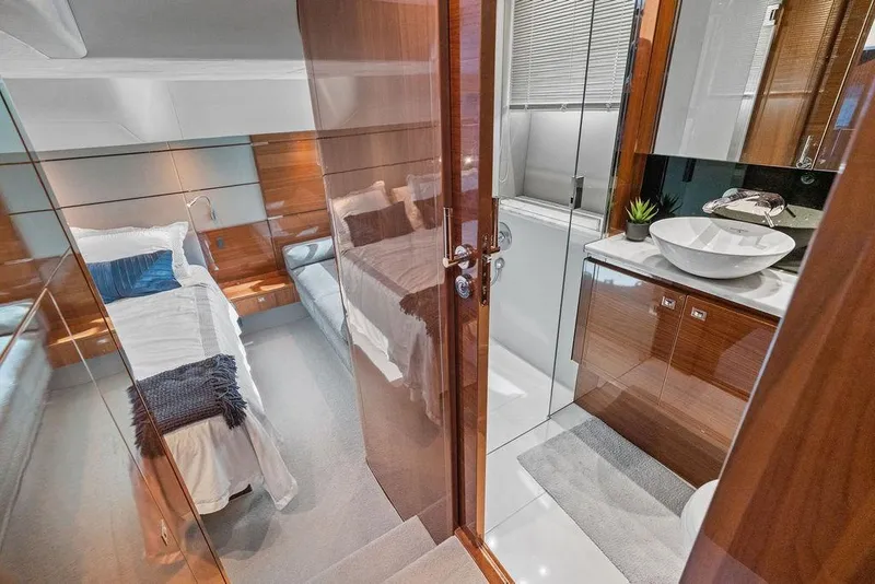 Slide: The Image of Luxurious interior of 2016 Princess 60 Flybridge Motor Yacht with modern bedroom and bathroom. - 53