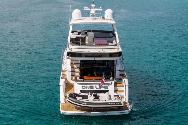 Slide: The Image of 2016 Princess 60 Flybridge Motor Yacht on open water, rear view. - 6