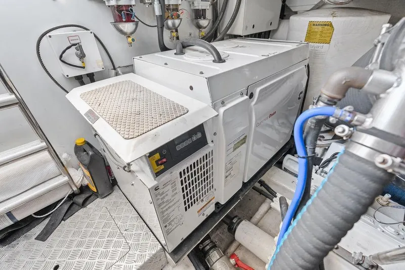 Slide: The Image of Engine room of 2016 Princess 60 Flybridge Motor Yacht with Cummins Onan generator. - 65