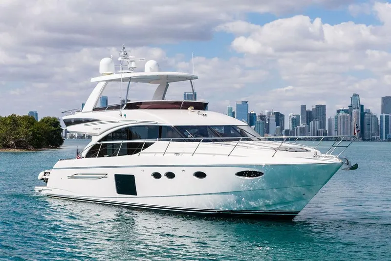 Slide: The Image of 2016 Princess 60 Flybridge Motor Yacht cruising near city skyline. - 9