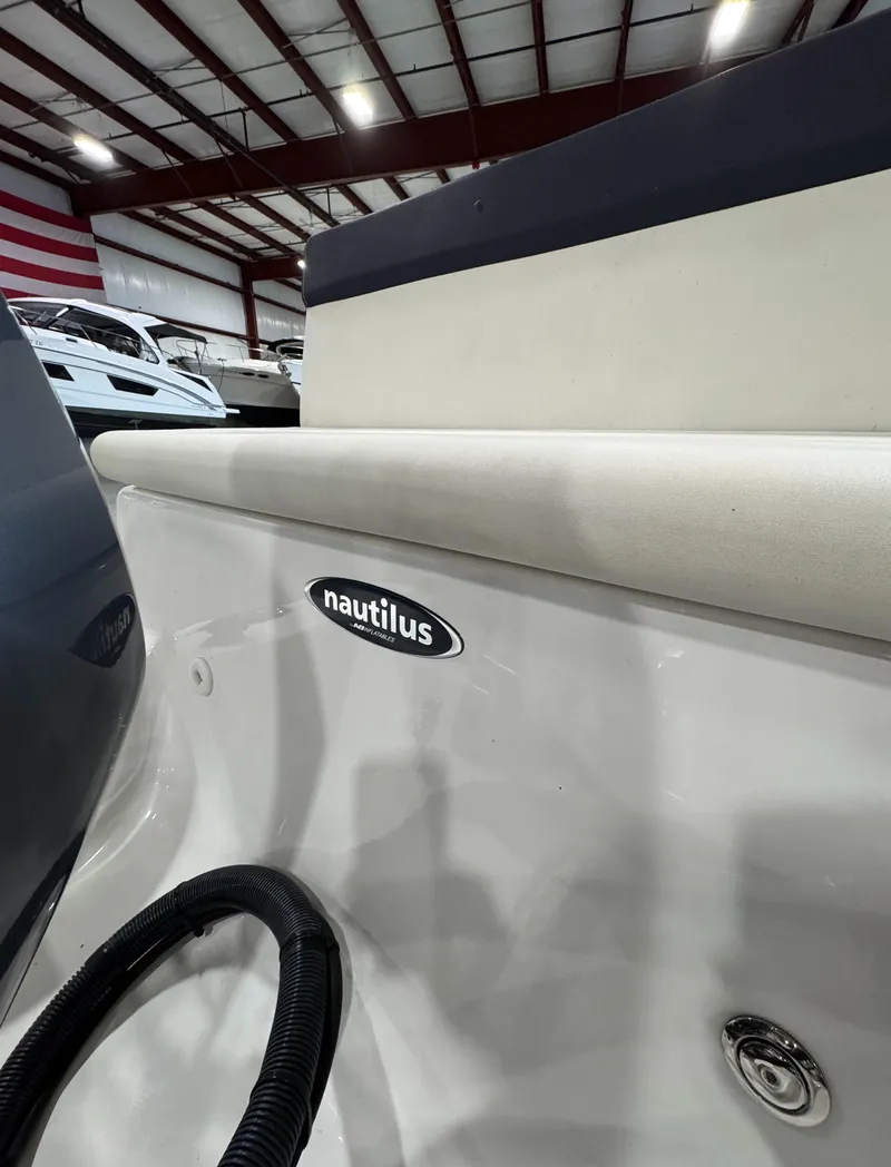 Slide: The Image of 2018 AB Inflatables Nautilus 12 DLX boat interior in showroom. - 22