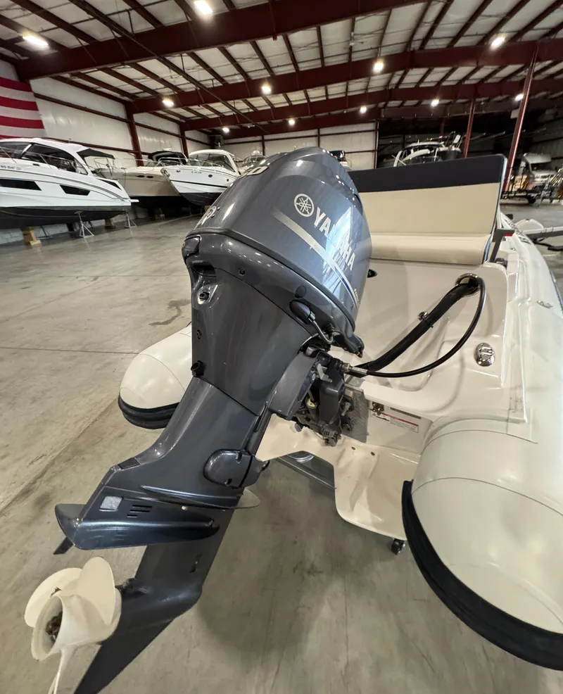 Slide: The Image of 2018 AB Inflatables Nautilus 12 DLX with Yamaha outboard motor in a showroom. - 8