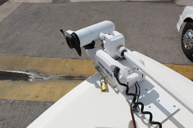 Slide: The Image of Minn Kota trolling motor mounted on 2019 Cobia 301 Center Console boat. - 14