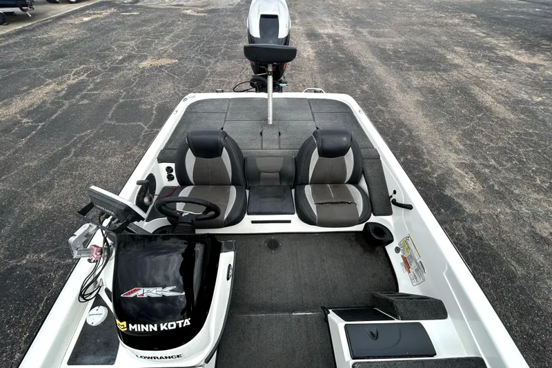 Slide: The Image of 2014 Skeeter TZX195 boat interior with Minn Kota motor and Lowrance electronics. - 24