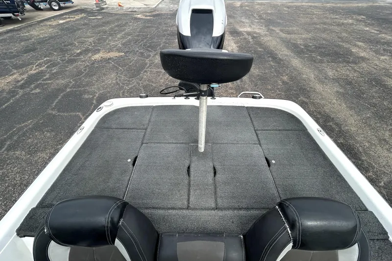 Slide: The Image of 2014 Skeeter TZX195 boat deck with seating and storage compartments. - 27