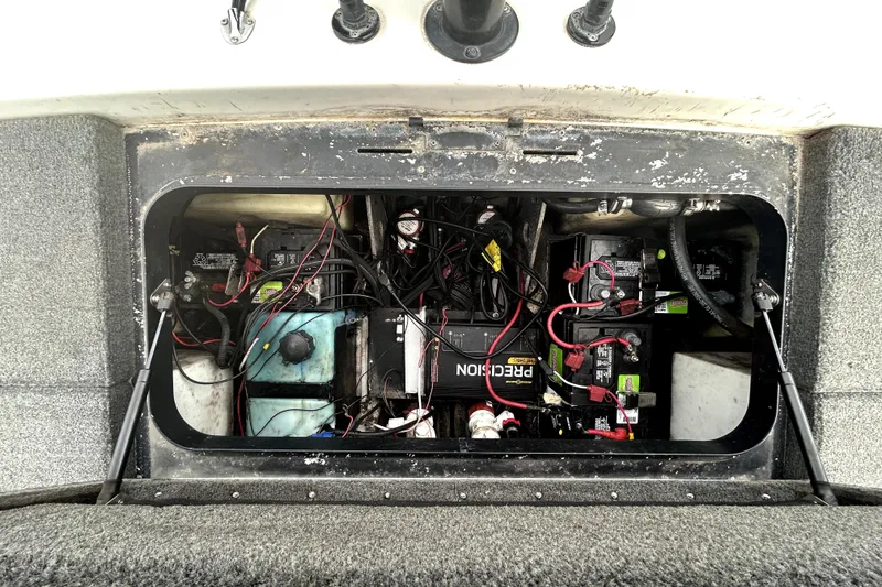 Slide: The Image of 2014 Skeeter TZX195 boat battery compartment with wiring and components. - 35