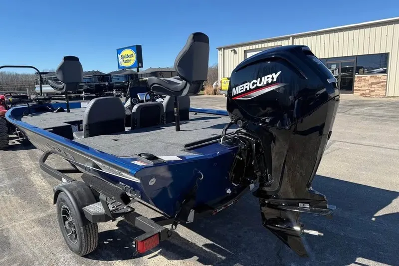 Slide: The Image of 2026 Lowe Stinger 175C boat with Mercury engine, parked outside Blackbeard Marine. - 5