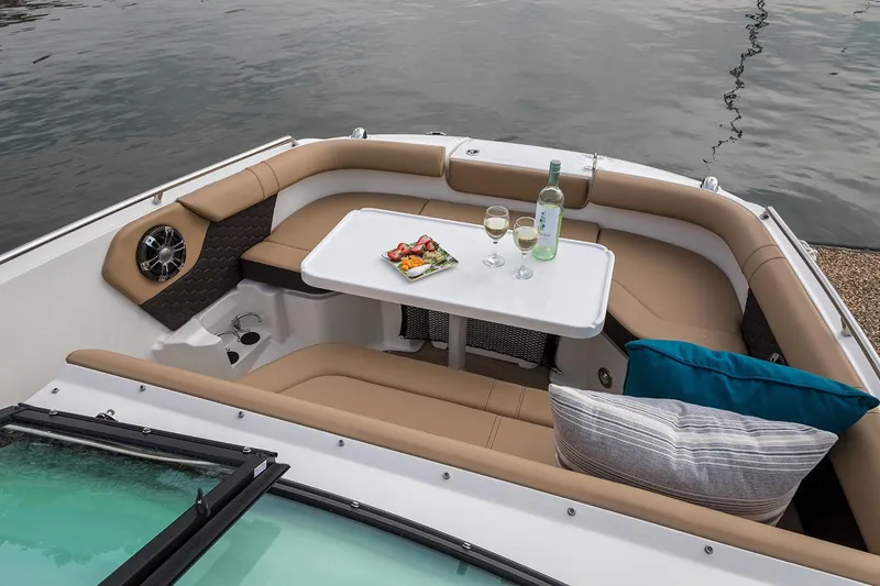 Slide: The Image of Manufacturer Provided Image: 2020 Sea Ray SDX 250 Outboard boat interior with table, food, and drinks - 6