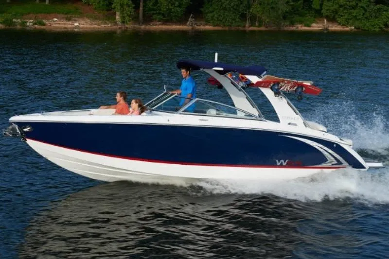 The Image of 2020 Cobalt R7 Surf boat cruising on a lake with passengers enjoying the ride. - 1