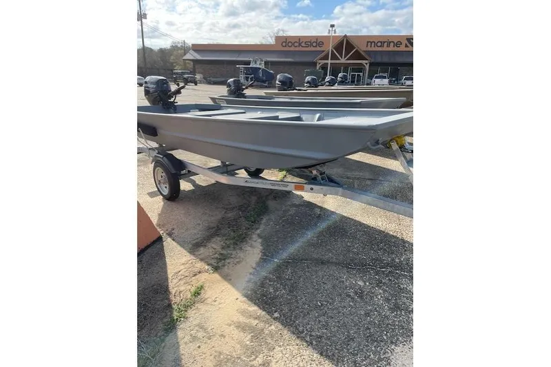 Slide: The Image of 2024 Southfork 1242 boat on trailer at dockside marine dealership. - 4