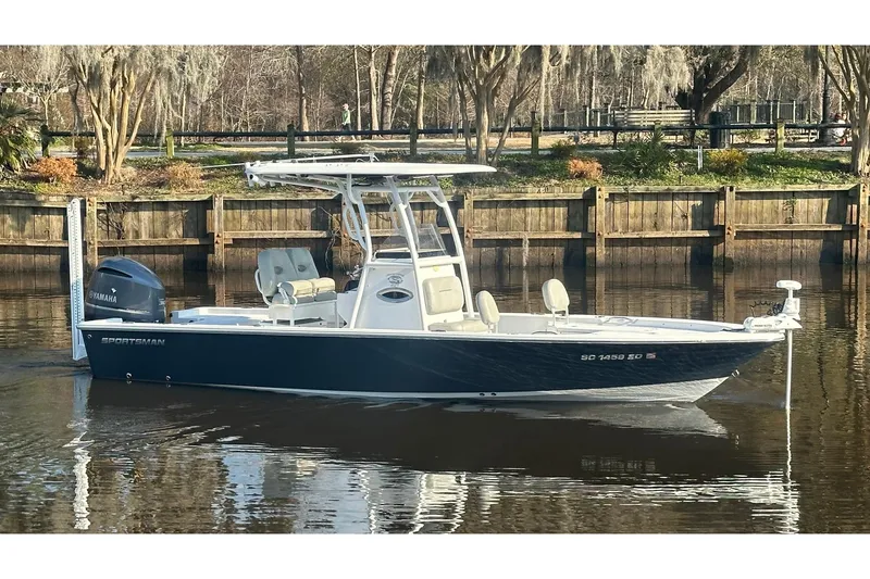 The Image of 2020 Sportsman Masters 247 Bay Boat on calm water, featuring Yamaha engine. - 0