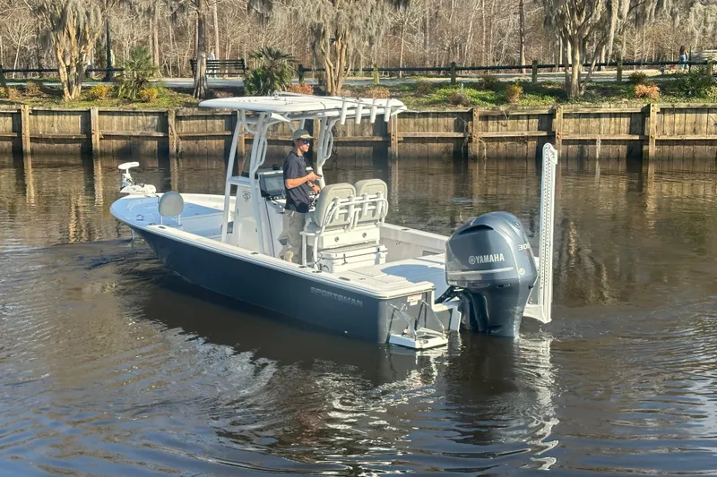Slide: The Image of 2020 Sportsman Masters 247 Bay Boat with Yamaha engine on a calm river. - 11