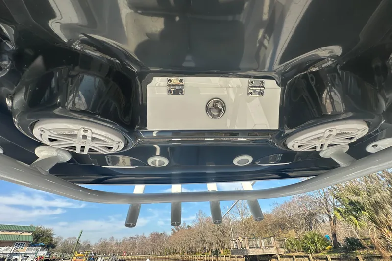 Slide: The Image of 2020 Sportsman Masters 247 Bay Boat T-top with speakers and rod holders. - 15