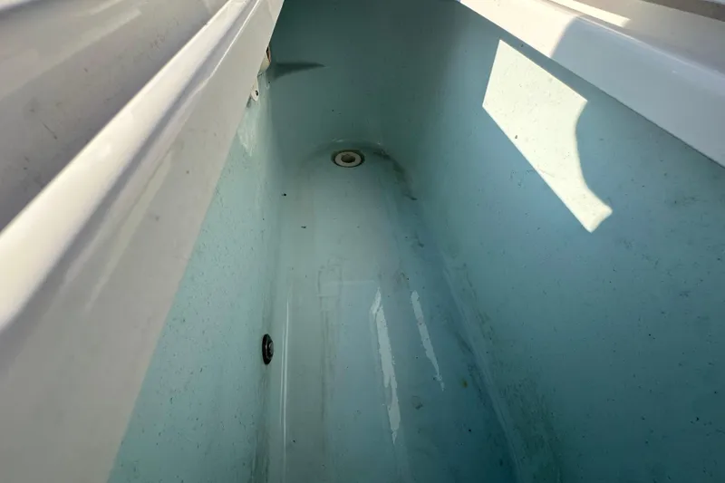 Slide: The Image of Interior view of a 2020 Sportsman Masters 247 Bay Boat compartment. - 21