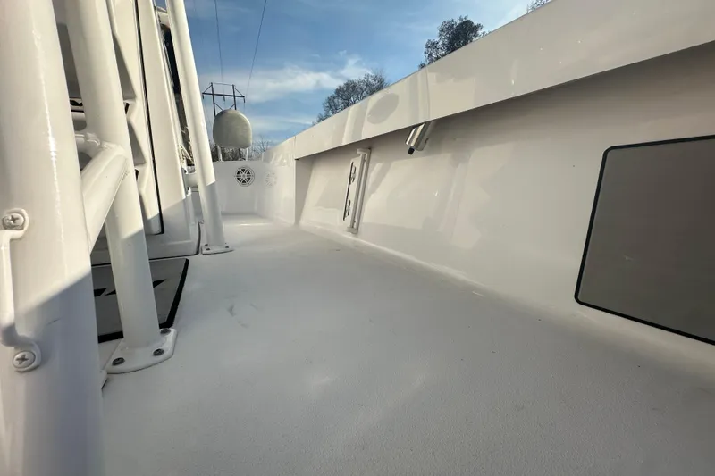 Slide: The Image of 2020 Sportsman Masters 247 Bay Boat deck, showcasing sleek design and spacious layout. - 24