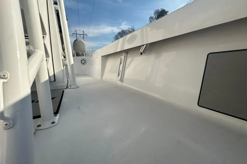 Slide: The Image of 2020 Sportsman Masters 247 Bay Boat deck, showcasing sleek design and spacious layout. - 25