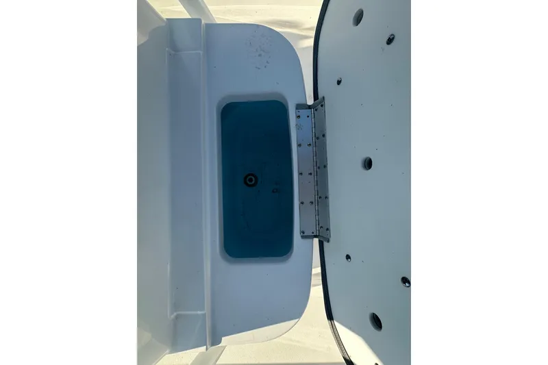 Slide: The Image of 2020 Sportsman Masters 247 Bay Boat livewell with open lid, showcasing interior design. - 29