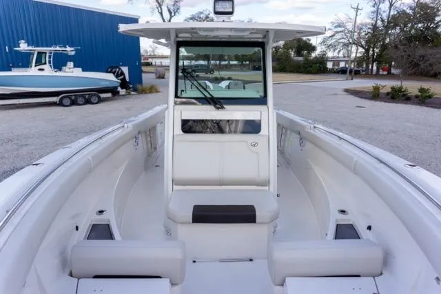 Slide: The Image of 2024 Sailfish 312 CC boat with spacious seating and modern design. - 33