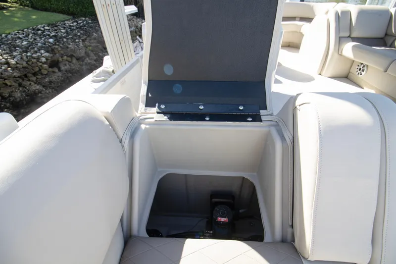 Slide: The Image of 2017 Bennington R 28 RSRX1 boat interior storage compartment with open lid. - 9