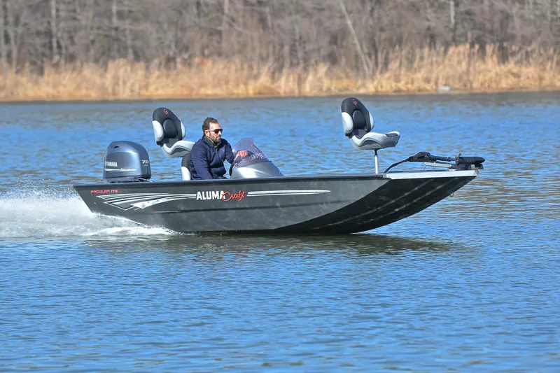 The Image of 2020 Alumacraft Prowler 175 boat cruising on a lake with a Yamaha motor. - 1
