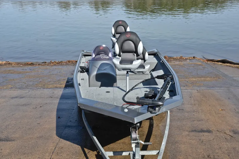 Slide: The Image of 2020 Alumacraft Prowler 175 boat on a ramp by the water. - 17