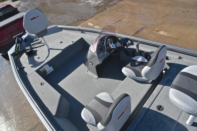 Slide: The Image of 2020 Alumacraft Prowler 175 boat interior with seating and steering console. - 22