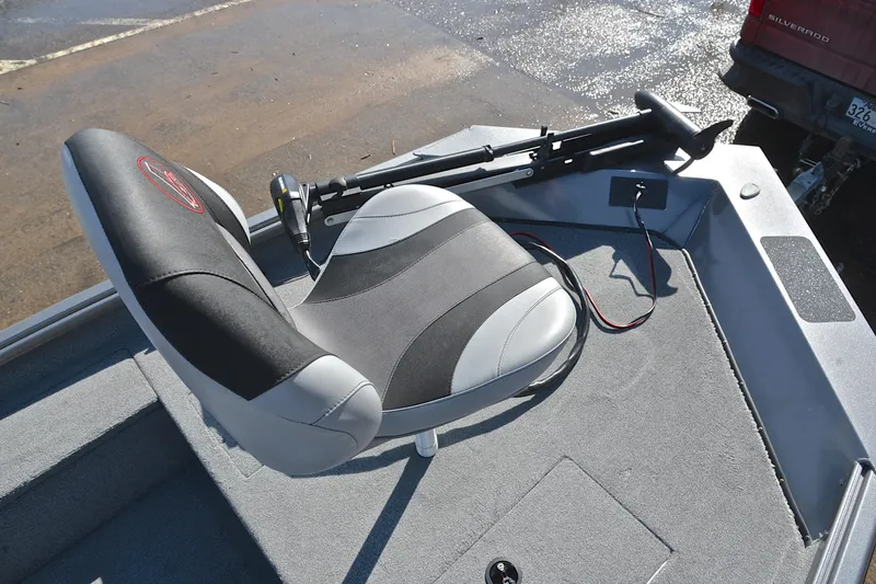 Slide: The Image of 2020 Alumacraft Prowler 175 boat interior with swivel seat and trolling motor. - 25