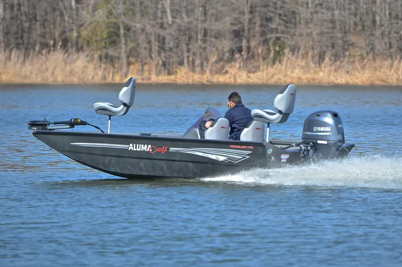 Slide: The Image of 2020 Alumacraft Prowler 175 boat cruising on a lake with Yamaha motor. - 4