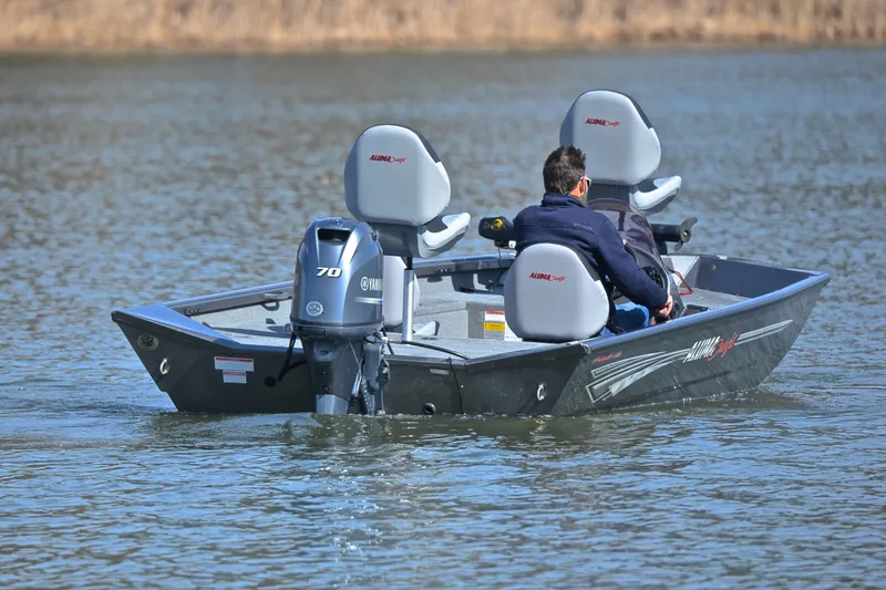 Slide: The Image of 2020 Alumacraft Prowler 175 boat with Yamaha 70 engine on a calm lake. - 8