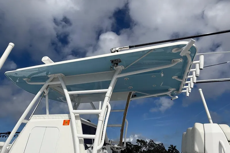 Slide: The Image of 2021 Invincible 36 CC boat with tower against cloudy sky. - 13