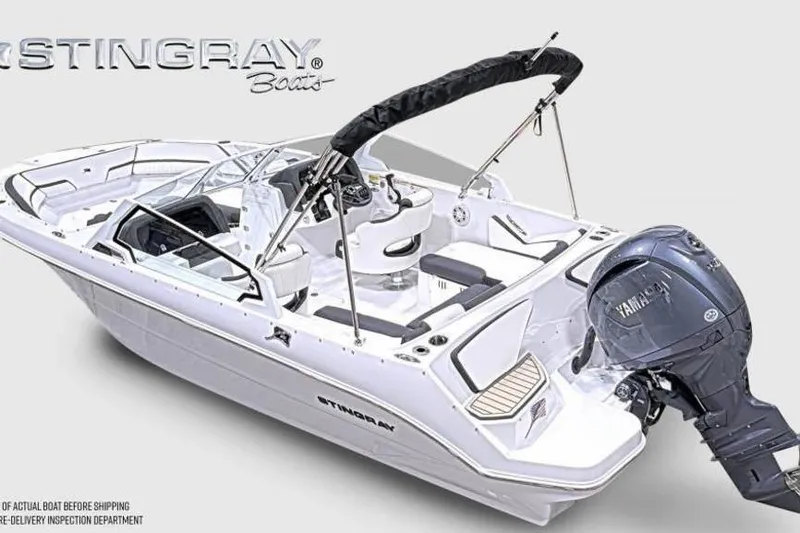 Slide: The Image of 2026 Stingray 20 SBX boat with Yamaha engine, sleek design, and modern features. - 7