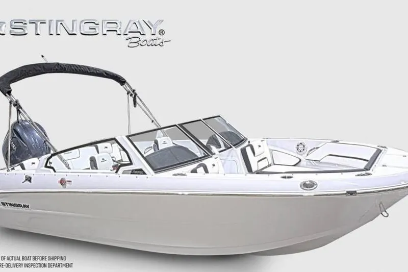 Slide: The Image of 2026 Stingray 20 SBX boat with sleek design and modern features. - 8