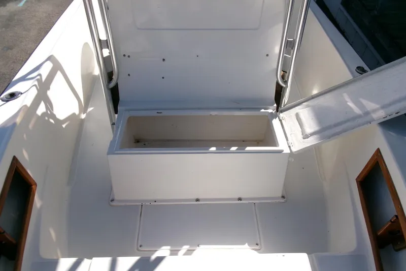 Slide: The Image of 1989 SeaCraft SC 20 Classic boat interior with open storage compartment. - 12