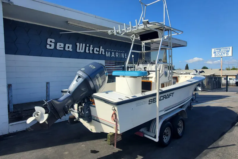 Slide: The Image of 1989 SeaCraft SC 20 Classic boat with Yamaha motor at Sea Witch Marine dealership. - 2
