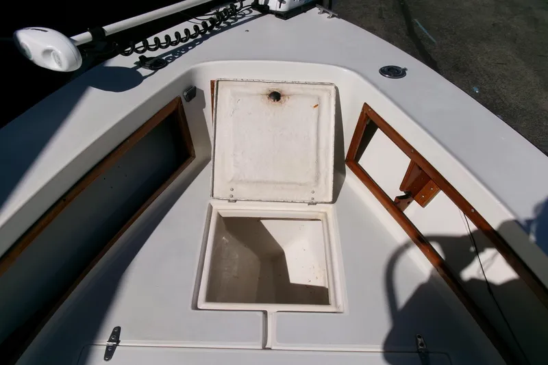 Slide: The Image of 1989 SeaCraft SC 20 Classic boat interior with open storage compartment. - 9