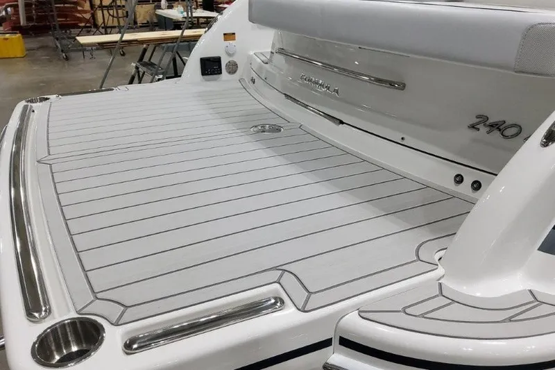 Slide: The Image of 2026 Formula 240 Bowrider boat deck with sleek design and stainless steel accents. - 20