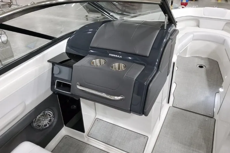 Slide: The Image of 2026 Formula 240 Bowrider interior with sleek dashboard and cup holders. - 30