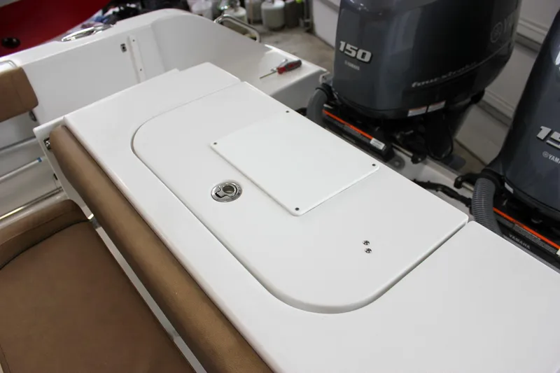 Slide: The Image of 2022 Sea Hunt Gamefish 25 boat with dual Yamaha 150 engines, featuring a sleek white deck. - 16