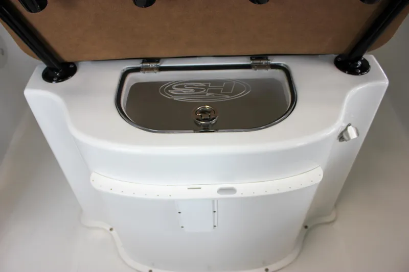 Slide: The Image of 2022 Sea Hunt Gamefish 25 livewell with sleek design and secure lid. - 23