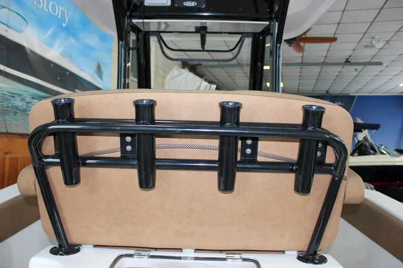 Slide: The Image of 2022 Sea Hunt Gamefish 25 boat with rod holders and cushioned seating. - 25