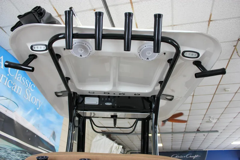 Slide: The Image of 2022 Sea Hunt Gamefish 25 boat with rod holders and speakers on T-top. - 26