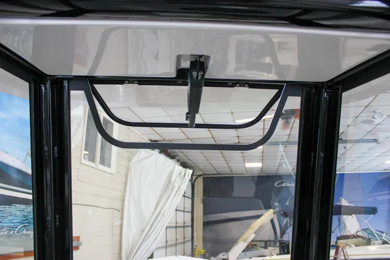 Slide: The Image of 2022 Sea Hunt Gamefish 25 interior view with window detail in showroom. - 33