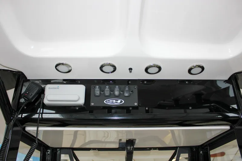 Slide: The Image of 2022 Sea Hunt Gamefish 25 console with Garmin electronics and control panel. - 34