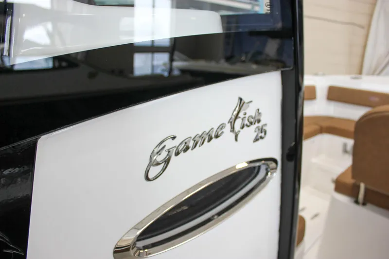Slide: The Image of 2022 Sea Hunt Gamefish 25 boat interior with logo detail. - 46