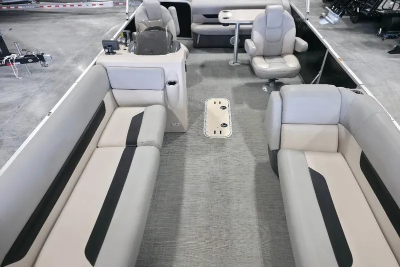 Slide: The Image of 2023 Princecraft Vectra 23 pontoon boat interior with spacious seating and modern design. - 6