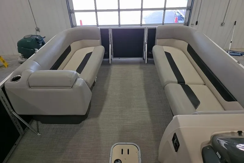 Slide: The Image of 2023 Princecraft Vectra 23 pontoon boat interior with spacious seating and modern design. - 7