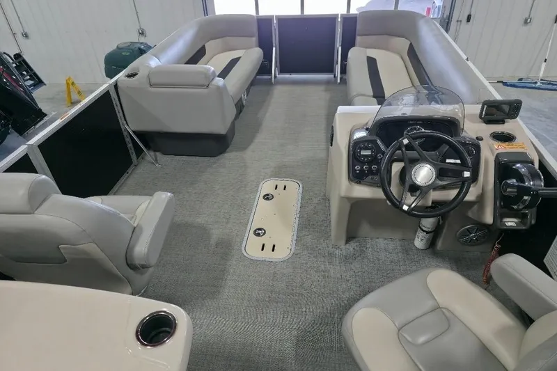 Slide: The Image of 2023 Princecraft Vectra 23 pontoon boat interior with steering console and seating. - 8
