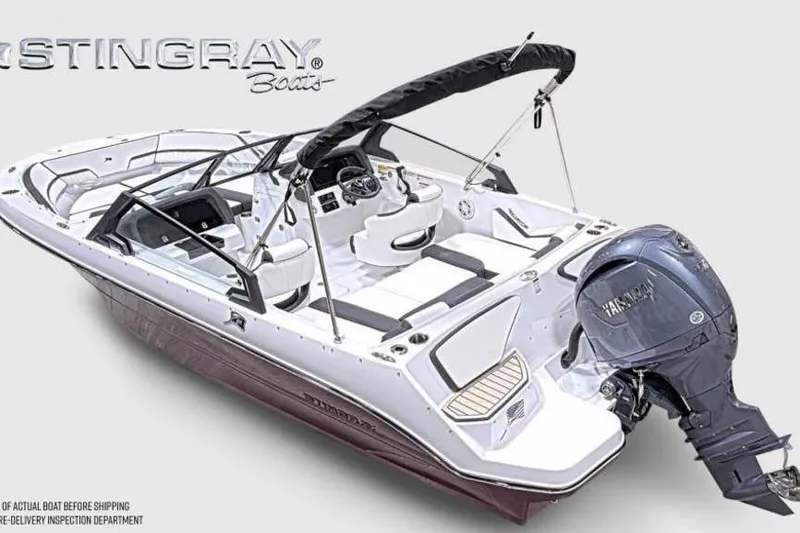 Slide: The Image of 2026 Stingray 20 SBX boat with Yamaha outboard motor, sleek design, and spacious seating. - 2